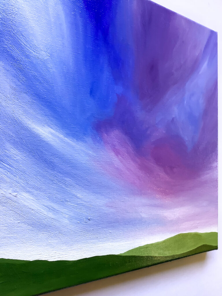 Painting side view of light and airy periwinkle clouds whisking past rolling hills below.